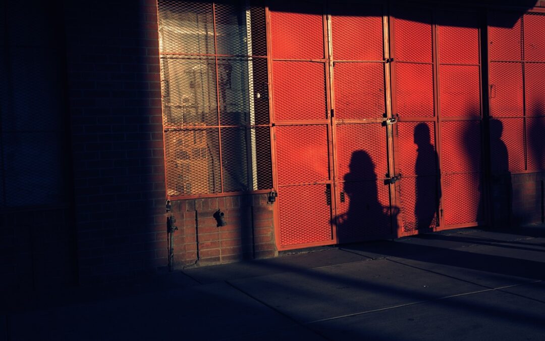 Man in red shadows by Paco Alonso via pexels